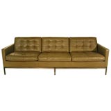 Leather sofa with solid bronze base by Florence Knoll
