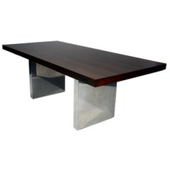 Rosewood desk with chrome double pedestal base by Dunbar