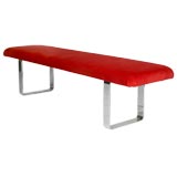 Red velvet bench with heavy chrome curved legs