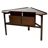 Triangular side table with magazine holders by Edward Wormley