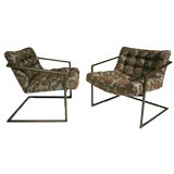 Pair of bronze colored cantilver lounge chairs