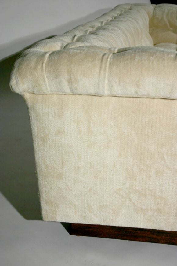 Chenille Dunbar tufted chenille sofa with mahogany plinth base