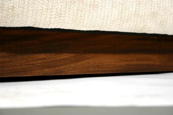 Dunbar tufted chenille sofa with mahogany plinth base 1