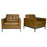 Pair of brown leather club chairs with bronze bases by Knoll