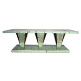 Silver and gold leaf cocktail table with three pedestals Silver and gold leaf cocktail table with three pedestals