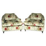 Pair of oversized printed floral velvet armchairs on casters