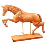 Articulated mahogany wooden horse