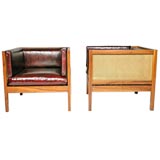 Pair of caned walnut and red leather cube lounge chairs