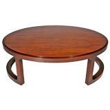 Rosewood oval cocktail table by Edward Wormley for Dunbar