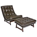 Sloped leather lounge chair and ottoman
