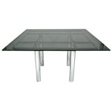 Square chrome and glass dining table by Tobia Scarpa