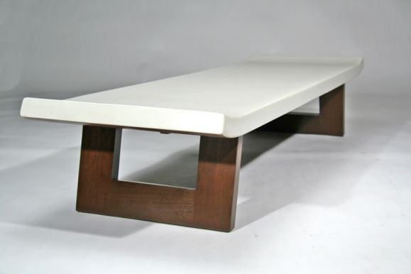 Cork top and mahogany coffee table  by Paul Frankl