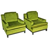 Green velvet club chairs with wood bases