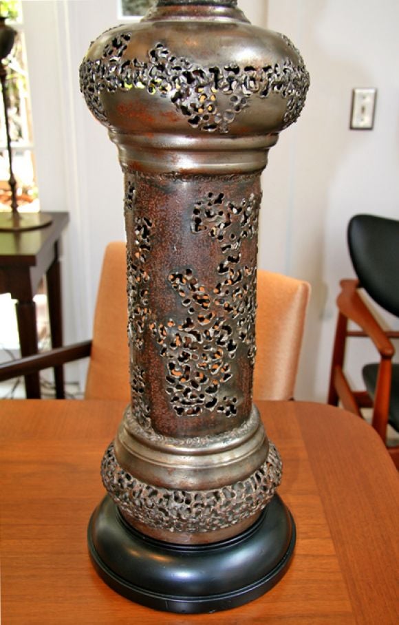 Pair of patinated pierced metal lamps by Marcello Fantoni