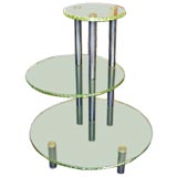 Tri-level asymmetrical glass table by Fontana Arte