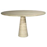 Round travertine pedestal table by Angelo Mangiarotti