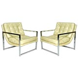 Pair of chrome frame faux alligator pearl leather arm chairs