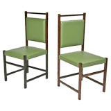 Pair of rosewood and green leather chairs by Sergio Rodrigues