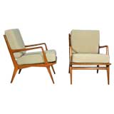 Pair of walnut lounge chairs by Carlo De Carli