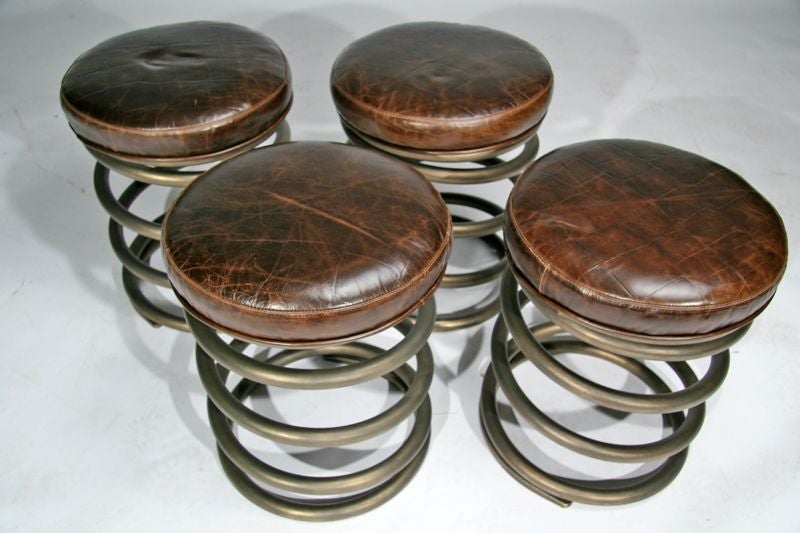 Bases are solid.  Upholstered in faux crocodile leather. Bases have a bronze finish.