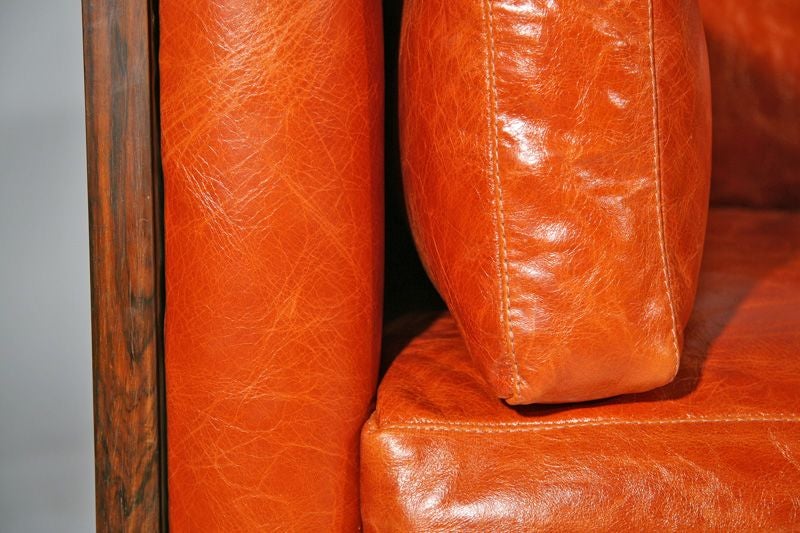 Rosewood sofa by Milo Baughman in orange distressed leather 1