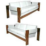 Pair of Metropolitan white leather and walnut sofas