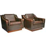 Pair of Leather Lounge Chairs on Rosewood Bases Pair of Leather Lounge Chairs on Rosewood Bases
