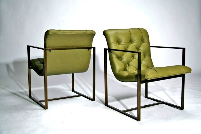 Pair of micro tufted bronze frame lounge chairs by Milo Baughman for Thayer coggin. Upholstered in a rich green leather. <br />
Seat Depth: 17