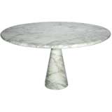 Round marble pedestal dining table by Angelo Mangiarotti