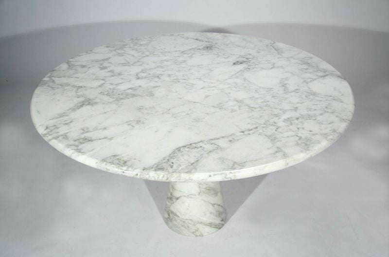 Round white carrera marble pedestal dining table designed by Angelo Mangiarotti.