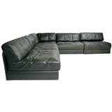 Black leather sectional sofa by De Sede