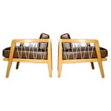 Pair of leather and wood lounge chairs by Edward Wormley
