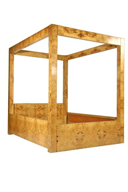 A monumental burl canopy bed designed by Milo Baughman for Thayer Coggin. This bed accommodates a queen size mattress, but could also be configured as a daybed.