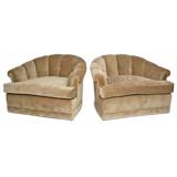 Pair of scalloped back lounge chairs by Monteverdi-Young