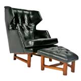 Leather wingback lounge chair and ottoman by Edward Wormley