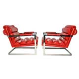 Pair of cantilevered leather chrome steel lounge chairs