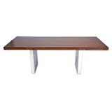 Rosewood case desk with mirrored metal pedestals by Dunbar