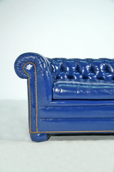 American Bright blue leather chesterfield sectional sofa with ottoman