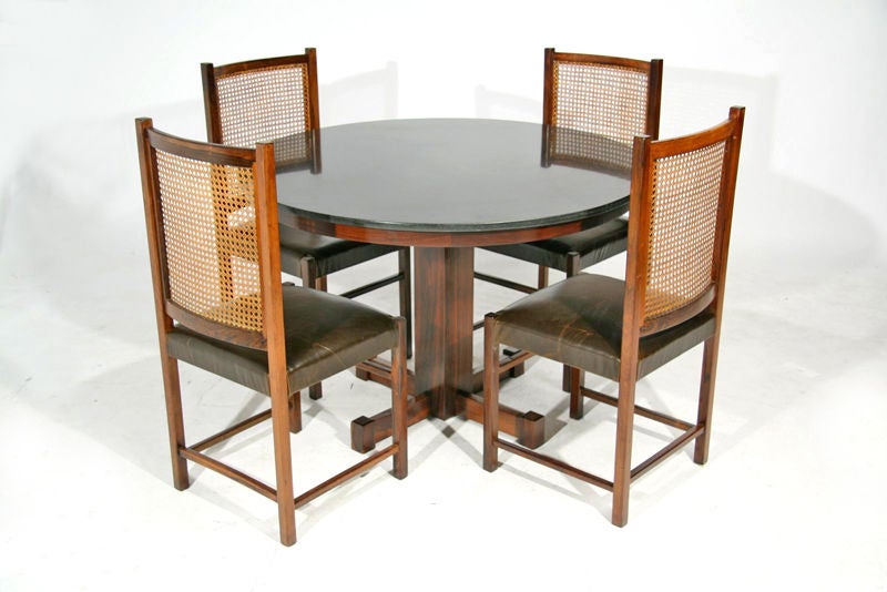Sergio Rodrigues round rosewood table with granite top