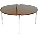 Round walnut and aluminum dining table by Jens Risom