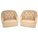Pair of tufted light pink leather lounge chairs by Ward Bennett