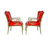 Asian modern brass frame lounge chairs with red leather cushions