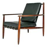 Sculpted rosewood and leather "Gelli" spindle back lounge chair