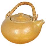 Small ochre glazed tea pot by Victoria Littlejohn