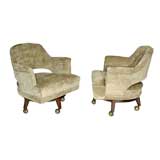 Pair of chenille swivel arm chairs by Monteverdi-Young