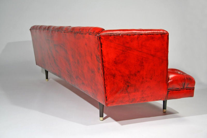 Mid-20th Century Dunbar high back red leather tufted sofa