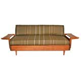 Exotic hardwood and leather winged craftsman sofa