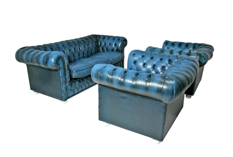 Blue chesterfield sofa.  See separate listing with a pair of matching chesterfield chairs.<br />
<br />
Seat depth: 22