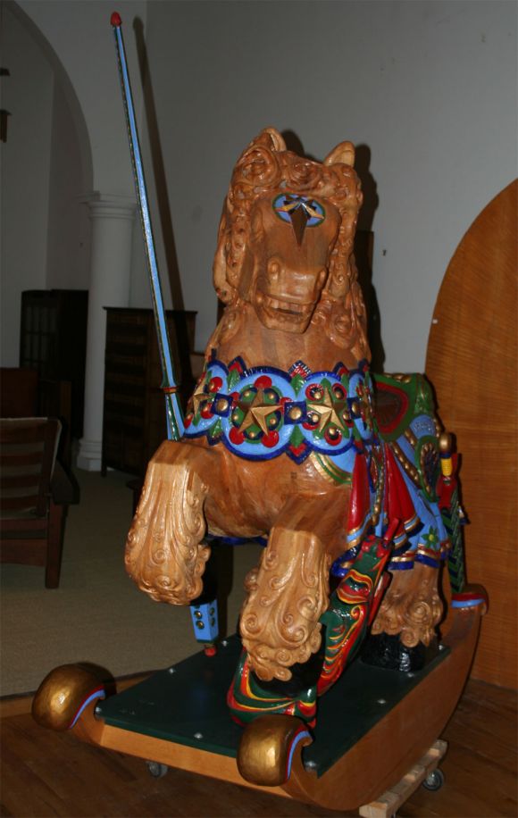 Hand carved and painted wooden rocking horse with removable lance and sword. Constructed by Tilo Kaufmann from 1984 to 1985. Featured on the cover of 