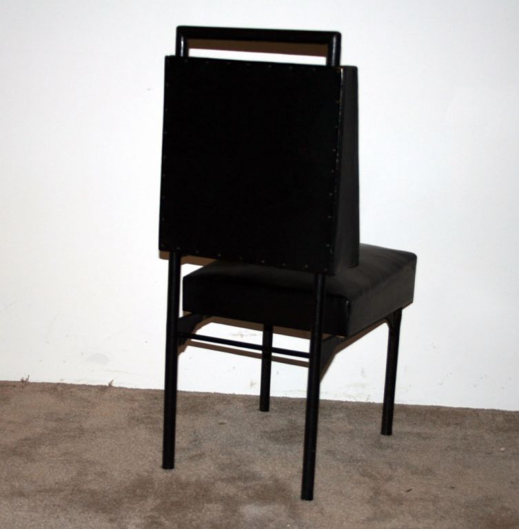 Leather Set of Six Chairs / Jacques Adnet.